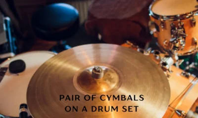 pair of cymbals on a drum set