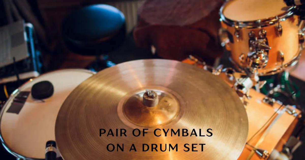 pair of cymbals on a drum set